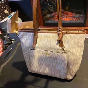 Michael Kors leather bag with matching wallet